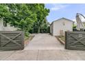 Private backyard features a detached garage and outdoor seating area at 24 Hanover St, Charleston, SC 29403