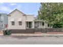 Charming home with a covered porch, fenced yard, and updated windows at 24 Hanover St, Charleston, SC 29403