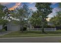 Charming single-story home with a two-car garage and white picket fence at 318 Seneca River Dr, Summerville, SC 29485