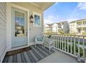 Cozy front porch featuring stylish outdoor seating and a welcoming atmosphere at 500 W Respite Ln, Summerville, SC 29483