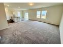 Bright, spacious living room with plush carpet flooring and ample natural light, perfect for Gathering gatherings at 526 Pender Woods Dr, Summerville, SC 29486