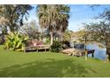 Beautiful backyard featuring a wooden deck extending to the waterfront at 739 Stiles Dr, Charleston, SC 29412