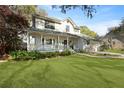 Charming two-story traditional home with a welcoming front porch and beautifully landscaped yard at 739 Stiles Dr, Charleston, SC 29412