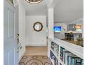 Bright and welcoming entryway with a view into the living area at 939 Mikell Dr, Charleston, SC 29412