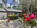 Charming brick home with a well-manicured front yard and inviting entrance at 1009 Highland Pines Rd, Ladson, SC 29456