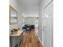 Inviting foyer with hardwood floors and a view into the adjacent living area at 102 Vango Dr, Goose Creek, SC 29445