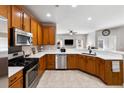 Spacious kitchen boasts stainless steel appliances, ample counter space, and plenty of cabinetry at 1233 Updyke Dr, Johns Island, SC 29455