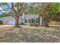 Inviting home with well-maintained landscaping, a two-car garage, and a charming facade, perfect for Gathering at 1932 Staffwood Rd, Johns Island, SC 29455