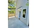 Private fenced backyard with a back door leading into the home at 1956 Beech Ave, North Charleston, SC 29405