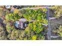 An aerial view of a beautiful property showcasing a home surrounded by lush greenery and privacy at 2037 Shell Ring Cir, Mount Pleasant, SC 29466