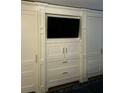 Custom built-in shelving and storage provide elegant and functional space at 330 Concord St # 15C, Charleston, SC 29401