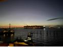 Breathtaking waterfront view at night, featuring a harbor with ships and a lighted bridge at 330 Concord St # Th 21, Charleston, SC 29401