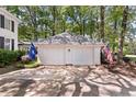 Two car detached garage with American and South Carolina flags at 3424 Henrietta Hartford Rd, Mount Pleasant, SC 29466