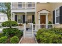 Inviting front porch with rocking chairs and manicured landscaping at 44 Savage St, Charleston, SC 29401