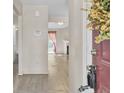 The entryway has wood floors that lead to a living room with a fireplace, creating a warm and inviting space at 621 Temple Rd # A, Ladson, SC 29456
