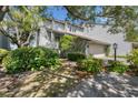 Charming two-story home with landscaped yard, mature trees, and private driveway at 642 Harbor Creek Pl # 21, Charleston, SC 29412
