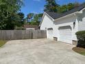Spacious two car garage with a private drive and backyard at 732 Gahagan Rd, Summerville, SC 29485