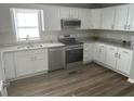 Modern kitchen with granite countertops, stainless steel appliances, and lots of natural light at 732 Gahagan Rd, Summerville, SC 29485