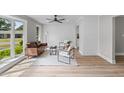 Bright living room features wood accents, a ceiling fan, and lots of natural light at 111 Driver Ave, Summerville, SC 29483