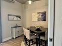 Bright dining room featuring modern decor, a sleek table, and stylish seating for intimate gatherings at 150 Bee St # 611, Charleston, SC 29401