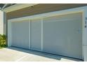 Screened garage door with white trim and the address 314 on the side at 314 Bear Paw Ln, Summerville, SC 29486
