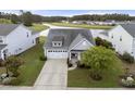 Charming home with a two-car garage, and well-maintained landscaping in a desirable community at 321 Sanctuary Park Dr, Summerville, SC 29486
