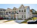 A new construction gray home exterior showcases a board and batten gable at 825 Alma Square Dr, Moncks Corner, SC 29461
