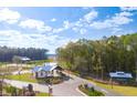 Scenic aerial view of the community entrance with lush landscaping and attractive architecture at 1157 Darling St, Summerville, SC 29485