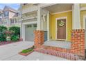 Inviting front porch with well-kept landscaping and appealing curb appeal at 1215 Dingle Rd, Mount Pleasant, SC 29466