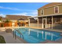 Refreshing backyard pool, screened porch and fenced yard for outdoor enjoyment and privacy at 1097 Briar Rose Ln, Ladson, SC 29456