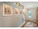 Stylish entryway featuring decorative wall molding and attractive lighting fixtures at 1755 Bolden Dr, Mount Pleasant, SC 29466