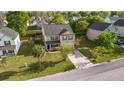 Aerial view of a two-story home in a residential neighborhood, complete with landscaped lawn at 2007 Robin Wood Blvd, Moncks Corner, SC 29461