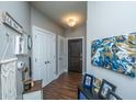 Cozy hallway with wood floors and decor, leading to bedrooms and living areas at 2244 Ashley Crossing Drive Dr # 621, Charleston, SC 29414