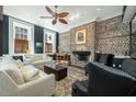 Cozy living room featuring a fireplace, comfortable seating, and stylish decor at 29 1/2 State St # B, Charleston, SC 29401