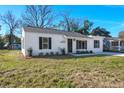 Charming single-story home with a well-manicured lawn and a classic white exterior at 3113 Matipan Ave, North Charleston, SC 29405