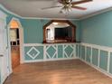 The living room features decorative molding, hardwood floors, and an arched entryway at 3342 Habitat Blvd Blvd, Johns Island, SC 29455