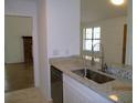 Modern kitchen featuring granite countertops, stainless steel appliances, and bright natural light at 4153 Hickory Ln, Ladson, SC 29456