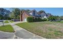 Charming two-story home with attached garage and landscaped yard at 101 N Warwick Trce, Goose Creek, SC 29445