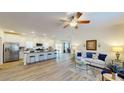 Bright, open-concept living space with modern furnishings adjacent to a spacious kitchen at 1576 Pine Grove Rd, Ruffin, SC 29475