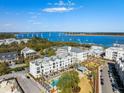 Aerial view showcasing the community, its pool, and proximity to the river and bridge at 508 Helmsman St, Charleston, SC 29492