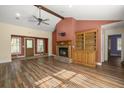 A living room featuring wood floors and a fireplace at 520 Givhans Rd, Ridgeville, SC 29472