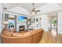 Cozy living room with fireplace, built-in shelving, and comfortable seating at 522 Antebellum Ln, Mount Pleasant, SC 29464