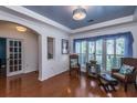 Cozy living room featuring hardwood floors and a stylishly decorated seating area at 107 Towering Pine Dr, Ladson, SC 29456