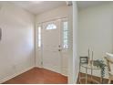 Bright entryway with beautiful wood floors and a charming side table, creating a welcoming space at 109 Winston Way, Goose Creek, SC 29445