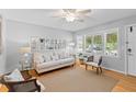 Bright living room with hardwood floors, fresh paint, neutral furnishings and window views at 1303 Teal Ave, Charleston, SC 29412