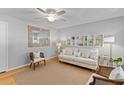 Inviting living room featuring hardwood floors, neutral color palette, and decorative shelving at 1303 Teal Ave, Charleston, SC 29412