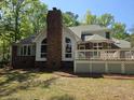 Spacious backyard featuring a beautiful home with an outdoor deck, perfect for relaxation and entertaining at 1855 Cherokee Rose Cir, Mount Pleasant, SC 29466