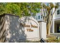 Pelican Point Villas community sign provides neighborhood identification and curb appeal at 1984 Folly Rd # A103, Charleston, SC 29412