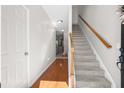 Inviting entryway featuring wood floors, staircase, and an open layout at 2505 Stadium Dr, North Charleston, SC 29406