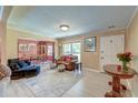 Cozy living room with hardwood floors, neutral walls, and comfortable seating area, and adjacent dining room at 2506 Birkenhead Dr, Charleston, SC 29414